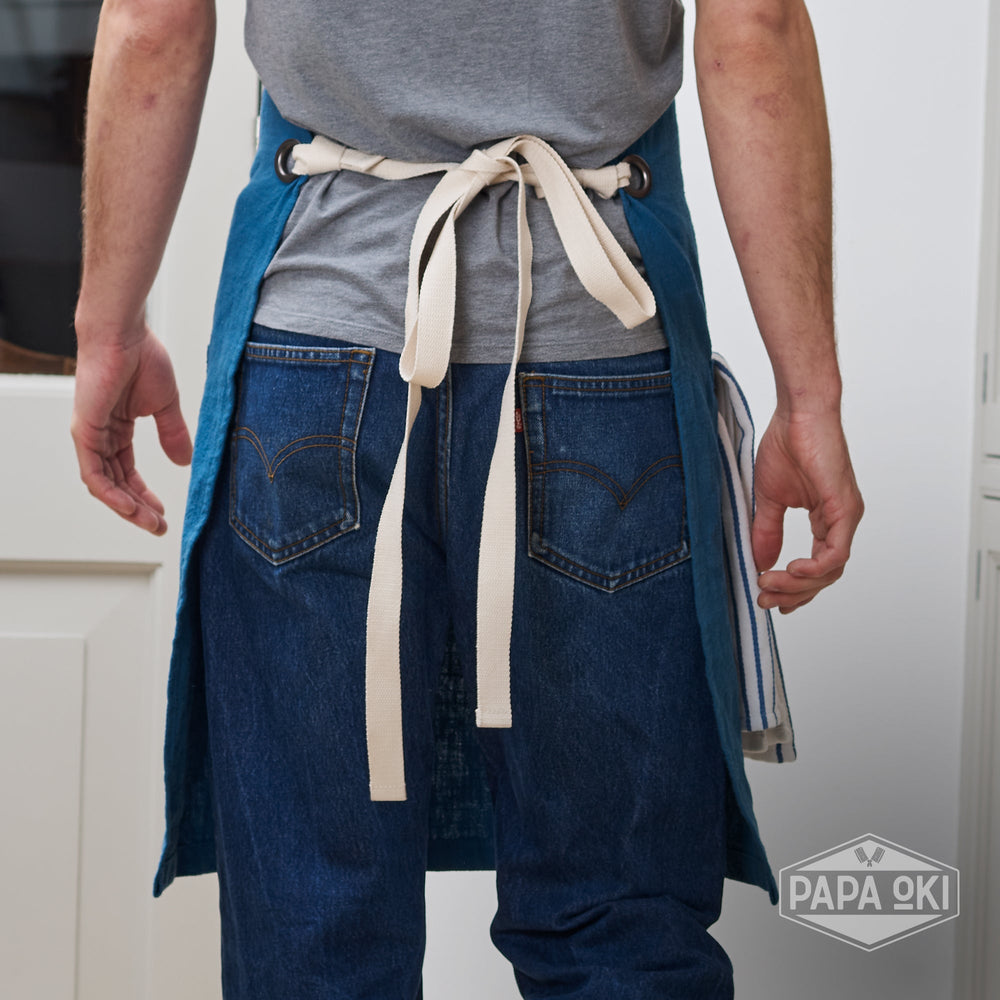 https://www.papa-oki.com/cdn/shop/products/soft-linen-apron-with-pockets-and-towel-loop-for-men-and-women-791185_1000x.jpg?v=1664808850